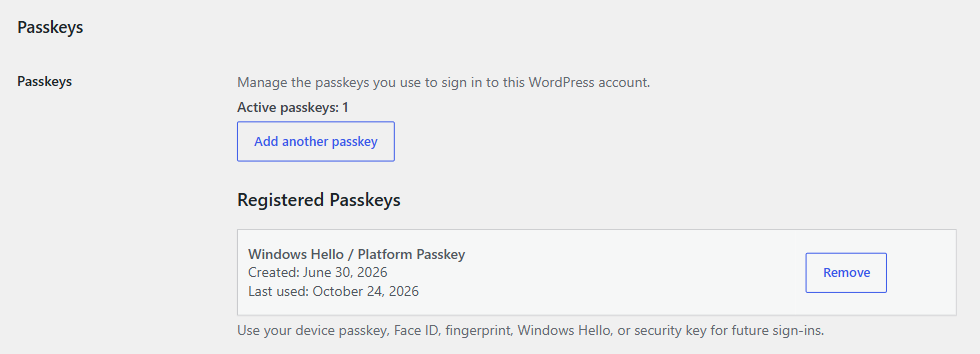 Passkey management in the WordPress profile: Add another passkey button and a registered passkey with created and last-used dates and a Remove button